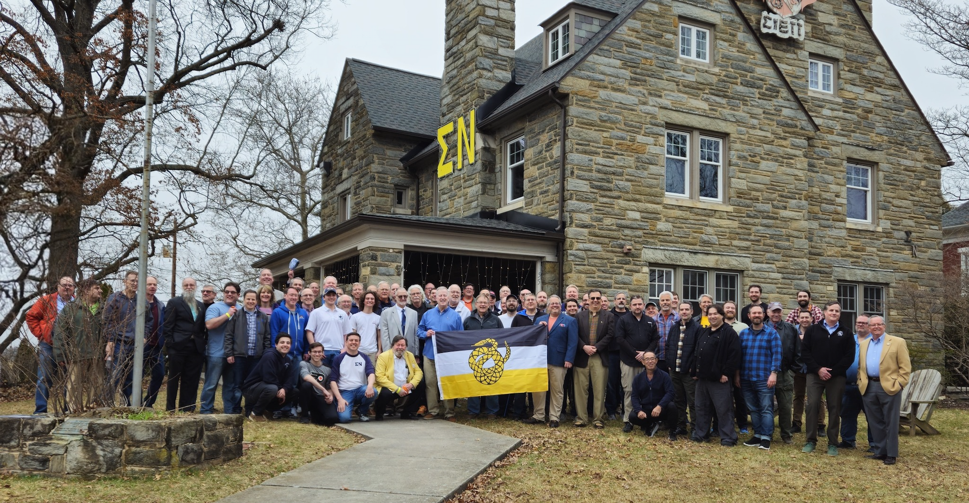 55 at 55 reunion — brothers from every era gathered in front of The Castle