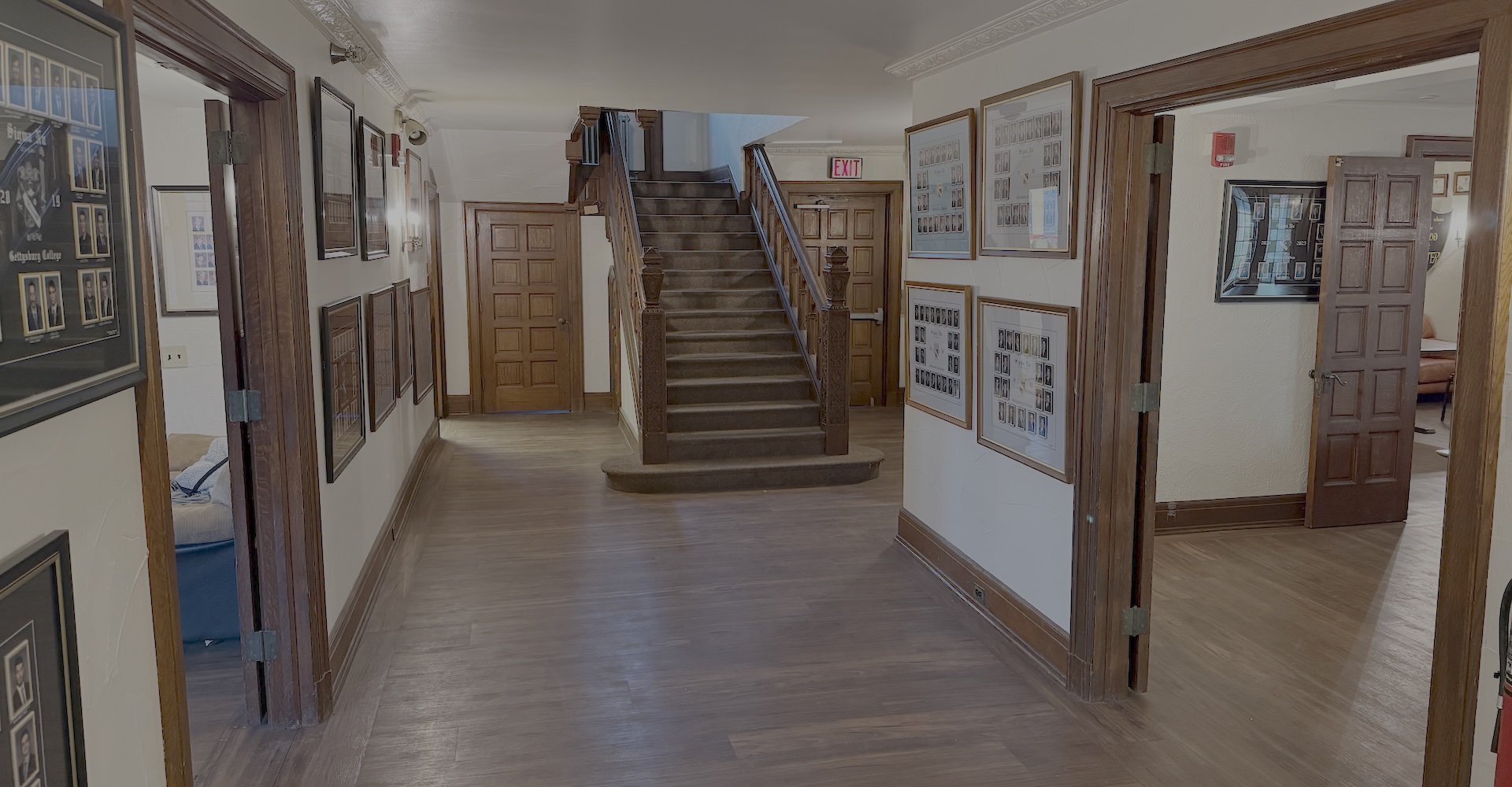 First floor hallway with chapter portraits