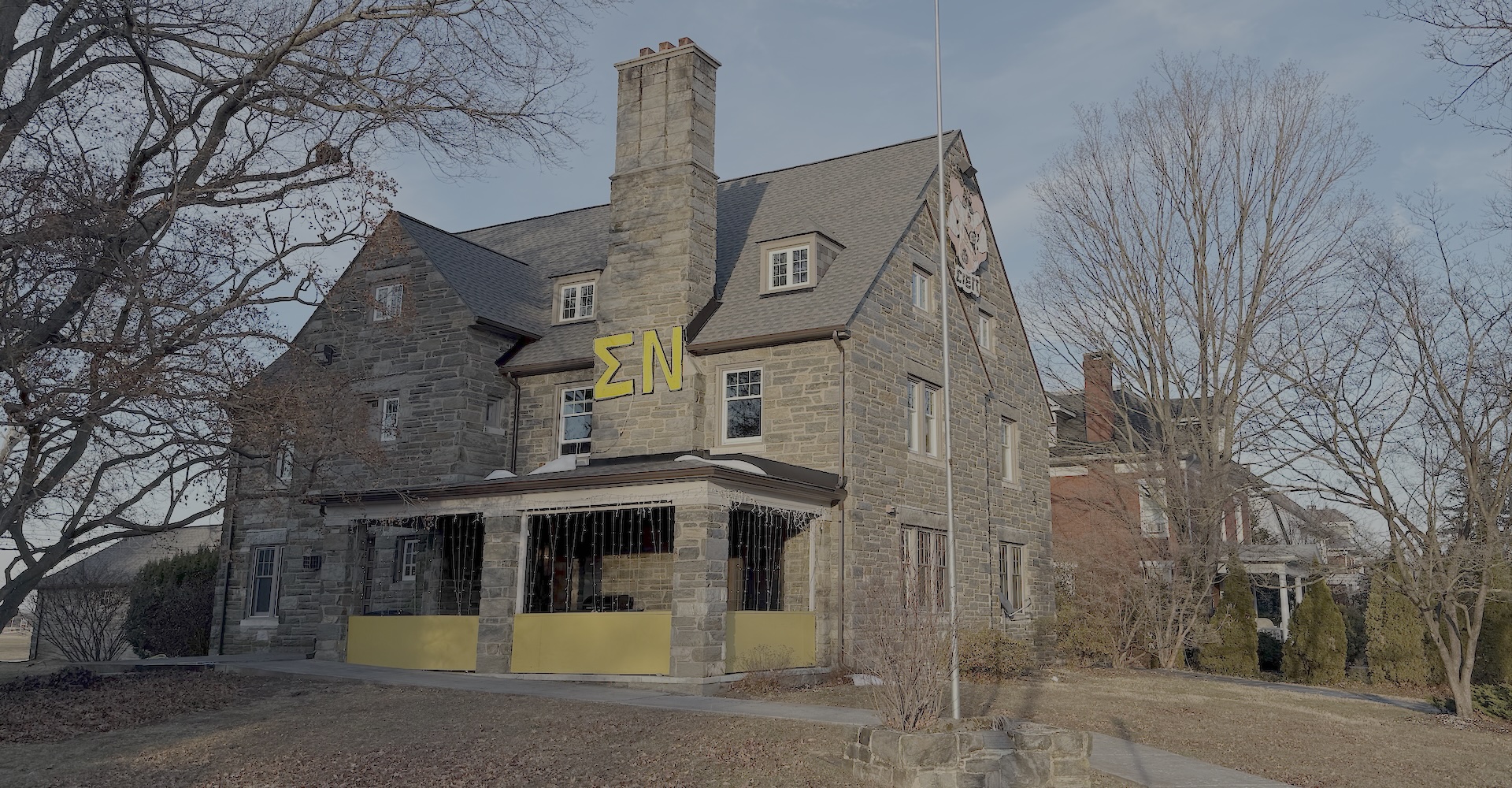 Sigma Nu chapter house exterior — 55 W. Broadway