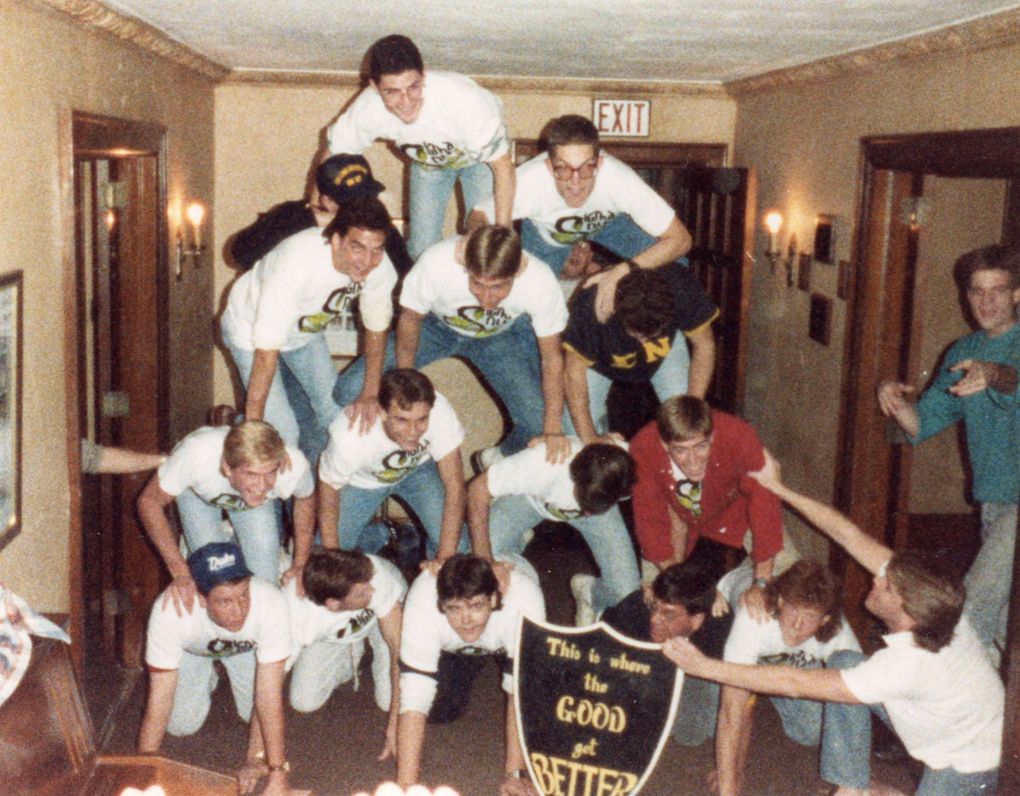 Brothers celebrating in the hallway of the house
